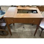 Vintage Singer electric sewing machine and accompanying table