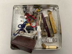 A box of various mixed items to include racecourse badges, assorted coins, paper knife and other
