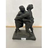 A bronzed composition model of two Sumo wrestlers signed M D Conway