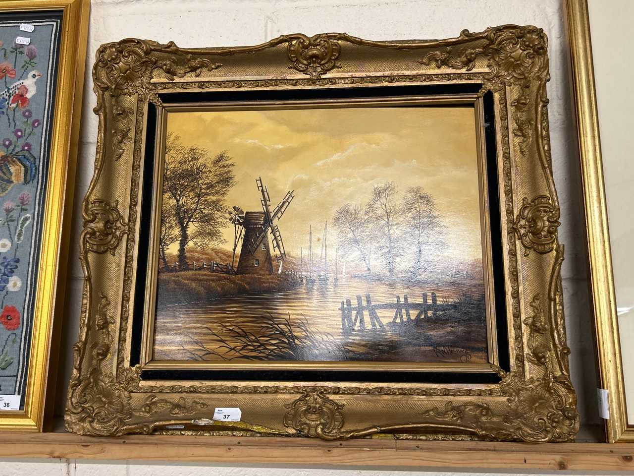 K W Hastings, study of a river scene with windmill, oil on board, gilt framed