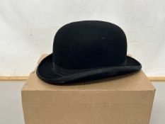 A bowler hat by Dunn & Co