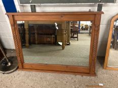 Modern stained pine framed wall mirror with barley twist uprights, 94cm wide