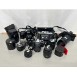 A group lot of cameras to include Pentax models MZ10, ME Super and a Nikon F50 together with a