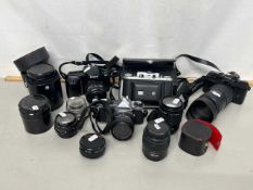 A group lot of cameras to include Pentax models MZ10, ME Super and a Nikon F50 together with a