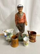 Modern golfer figure together with various tankards and other ceramics