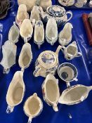 Collection of various porcelain gravy boats, teapots etc