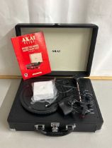 An Akia retro portable record player