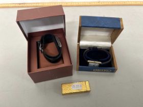 Dunhill gold plated cigarette lighter together with a Seiko wristwatch with quartz movement and a