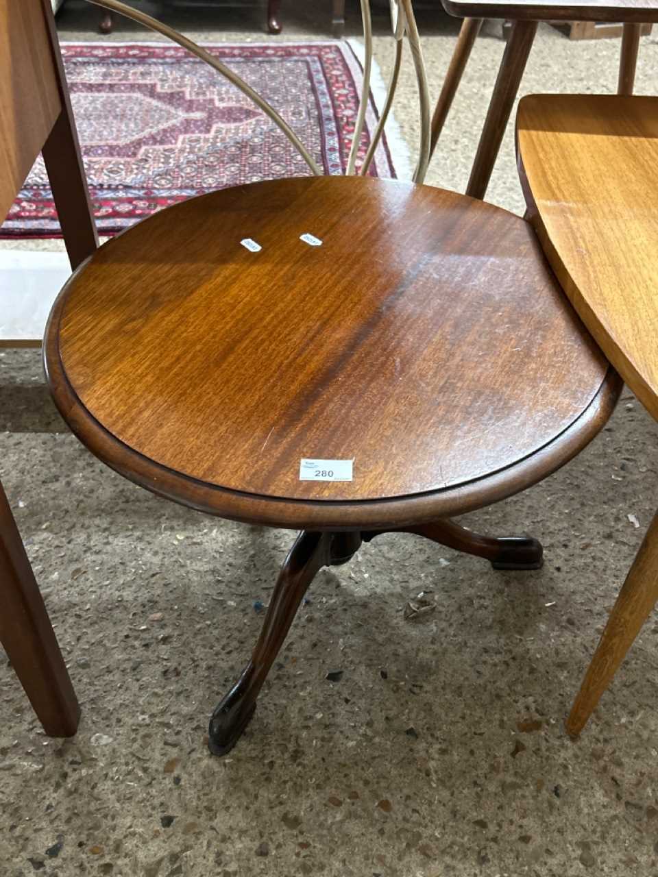 Modern circular topped occasional table