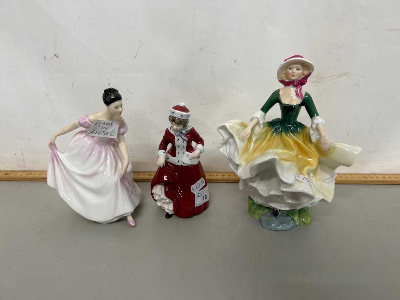 A Royal Doulton figurine Danielle signed and dated 1992 together with two further Royal Doulton
