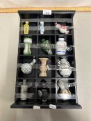 Small wall mounted collectors cabinet containing twelve reproduction Chinese miniature vases