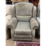 Floral upholstered wing back armchair