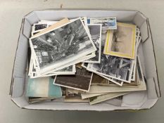 Box of various vintage photographs, cigarette cards, etc