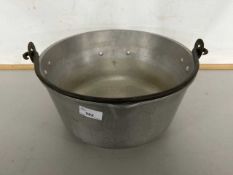 An aluminium jam pan