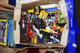 Toy cars and trucks, play worn