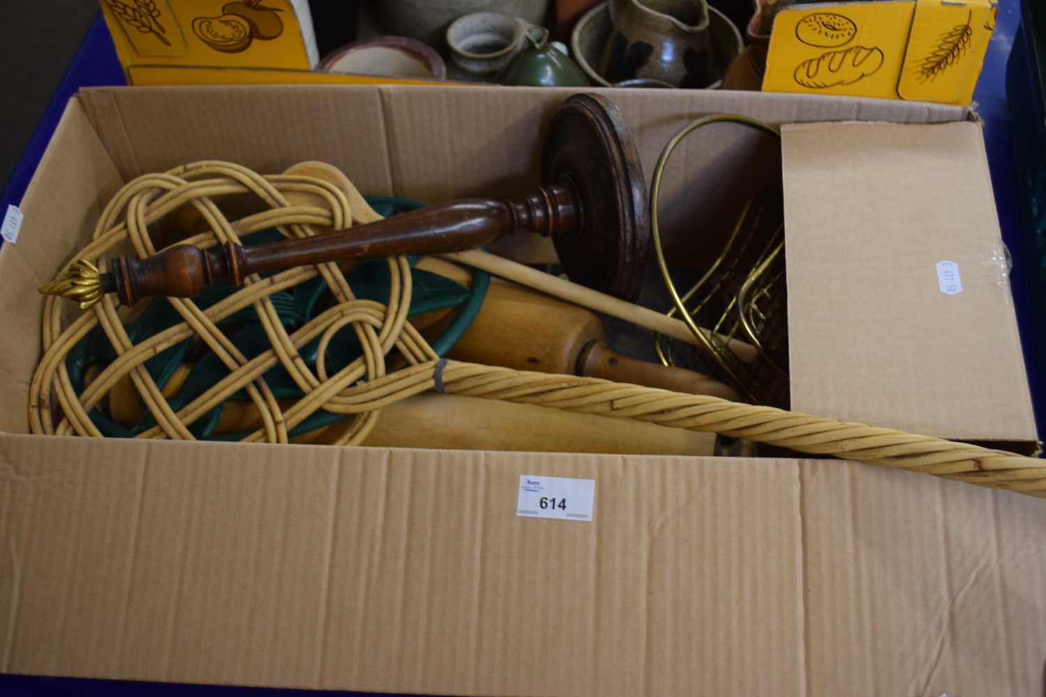 Box of mixed items to include vintage rolling pins, carpet beater, brass letter rack etc