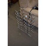 A pair of metal wine racks