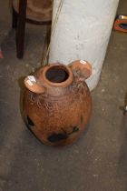 A two handled terracotta pot