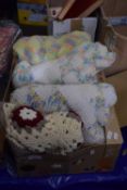 Box of various small crochet and knitted blankets