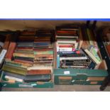 Two boxes of assorted hard back books