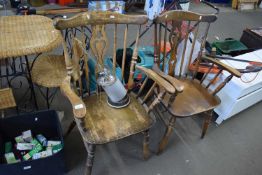 A pair of pine kitchen chairs