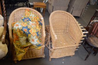 A pair of wicker conservatory/garden chairs