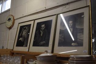 Three framed photographs of movie stars
