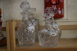 Four decanters and Staffordshire porcelain labels
