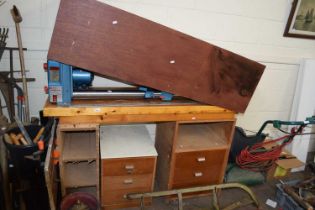 A wood lathe and work bench