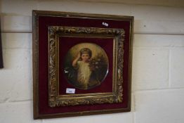 Study of a small child in ornate red velvet and gilt frame