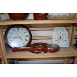 A faux red leather barometer wall clock and another