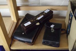 A vintage fan, boxed together with a camera and two cases