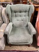 Button back wing armchair