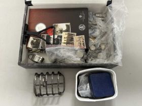 Box containing various assorted British commemorative crowns and other coinage, silver plated