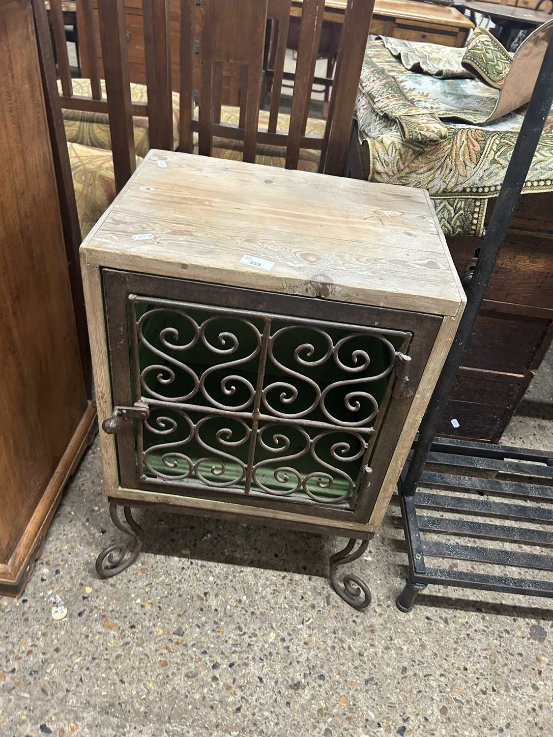 A small pine cupboard or meat safe with iron work door