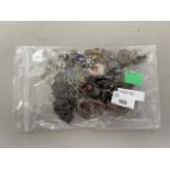 Bag of various assorted costume jewellery, silver plated buckle etc