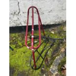 Three iron saddle racks