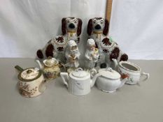 Mixed Lot: Pair of Staffordshire dogs together with various teapots and a pair of continental