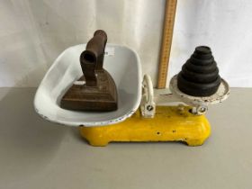 Vintage kitchen scales with weights together with a flat iron
