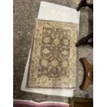 Small Angora goat wool Turkish rug, 98 x 60cm together with a further small plain wool rug, 120 x