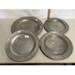 Group of four circular pewter dishes