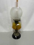 Late Victorian oil lamp with amber glass font and frosted glass shade