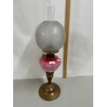 Early 20th Century oil lamp with pink glass font and frosted glass shade