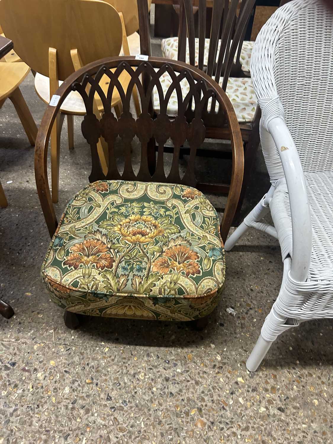 Early 20th Century hardwood framed low nursing chair