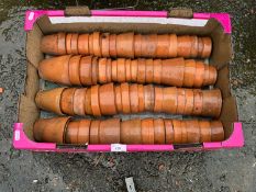 Box of small terracotta plant pots