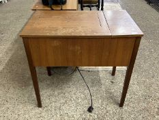 Sewing machine on table