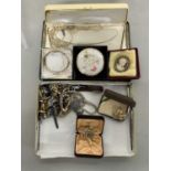 Tin of various assorted costume jewellery