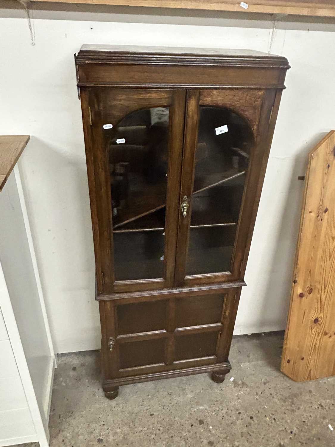 20th Century oak bookcase cabinet with glazed top section and cupboard base