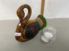 An Indian wooden model of a swan together with a glass dressing table jar