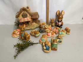 Collection of Pendelfin model rabbits together with further fruit shop model